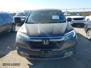 2020 Honda Ridgeline RTL-E with VIN 5FPYK3F72LB011694, listed as a IAAI auction lot 41628184 with 76,011 mi miles. Bid and sale history available at carsss.com. Image 12.