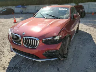 2020 BMW X4 xDrive30i with VIN 5UX2V1C02L9B79123, listed as a Copart auction lot 60143412 with 0 mi miles. Bid and sale history available at carsss.com. Image 2.