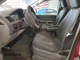 2010 Chrysler Town & Country LX with VIN 2A4RR4DE6AR198174, listed as a Copart auction lot 50757005 with 211,130 mi miles and Salvage Title. Bid and sale history available at DreamBid. Image 7.