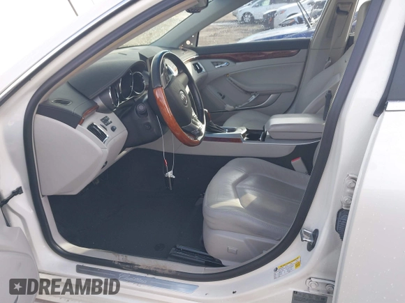 2012 Cadillac CTS Premium with VIN 1G6DP5E3XC0144157, listed as a IAAI auction lot 41311350 with 96,042 mi miles and . Bid and sale history available at DreamBid. Image 5.