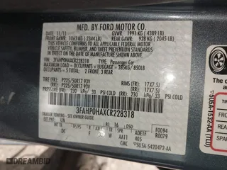 2012 Ford Fusion SE with VIN 3FAHP0HAXCR228318, listed as a IAAI auction lot 42048711 with 76,700 mi miles. Bid and sale history available at carsss.com. Image 9.