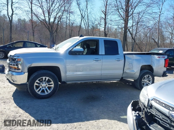 2018 Chevrolet Silverado 1500 LT with VIN 1GCVKREH4JZ323242, listed as a IAAI auction lot 41971945 with 63,915 mi miles and . Bid and sale history available at DreamBid. Image 14.