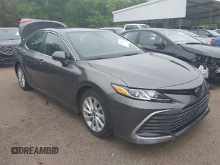 2023 Toyota Camry LE with VIN 4T1C11AK8PU121390, listed as a IAAI auction lot 41959383 with 49,233 mi miles. Bid and sale history available at carsss.com. Image 1.