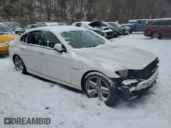 2015 BMW 5 Series 550i with VIN WBAKN9C55FD960970, listed as a Copart auction lot 84994434 with 105,593 mi miles and Salvage title. Bid and sale history available at DreamBid. Image 4.