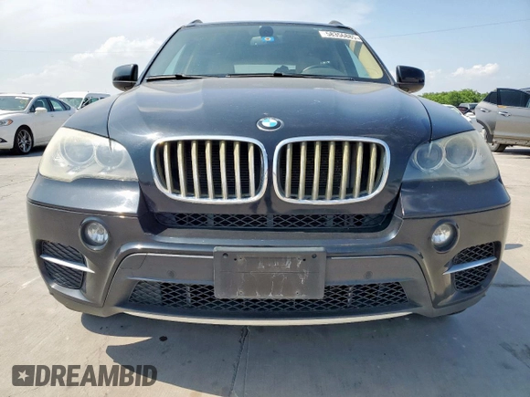 2012 BMW X5 35d with VIN 5UXZW0C57CL664245, listed as a Copart auction lot 58356885 with 148,517 mi miles and Clean title. Bid and sale history available at DreamBid. Image 5.
