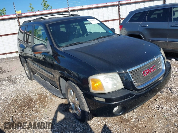 2002 GMC Envoy SLT z VIN 1GKDT13S322146884, wystawiony jako IAAI lot #42244937 z przebiegiem 203 633 mil mil oraz . Historia ofert i sprzedaży dostępna na DreamBid. Obrazek 1.