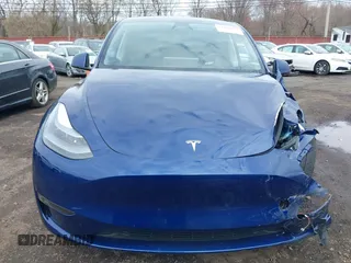 2023 Tesla Model Y Long Range with VIN 7SAYGDEE4PF891709, listed as a IAAI auction lot 41944893 with 15,864 mi miles. Bid and sale history available at carsss.com. Image 20.
