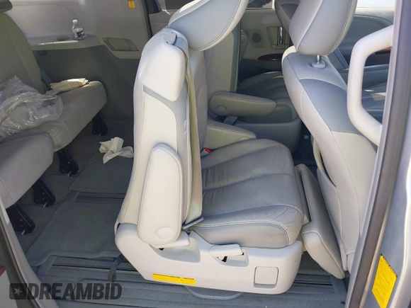 2012 Toyota Sienna XLE AAS with VIN 5TDYK3DC7CS185555, listed as a IAAI auction lot 42013098 with 140,969 mi miles. Bid and sale history available at carsss.com. Image 8.