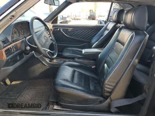 1989 Mercedes-Benz 560 with VIN WDBCA45E4KA498009, listed as a Copart auction lot 53897215 with 366,931 mi miles and Clean Title. Bid and sale history available at DreamBid. Image 7.