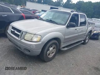 2003 Ford Explorer Sport Trac XLS z VIN 1FMZU67E63UC48939, wystawiony jako IAAI lot #42526151 z przebiegiem 221 402 mil mil oraz . Historia ofert i sprzedaży dostępna na DreamBid. Obrazek 2.