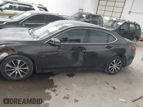 2015 Acura TLX Technology with VIN 19UUB1F51FA002302, listed as a IAAI auction lot 41450716 with 124,498 mi miles and . Bid and sale history available at DreamBid. Image 14.