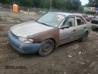 1998 Toyota Corolla VE with VIN 2T1BR12E0WC020440, listed as a Copart auction lot 64402945 with Not provided miles and Salvage title. Bid and sale history available at DreamBid. Image 1.