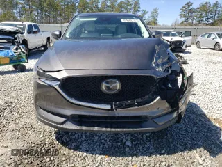 2018 Mazda CX-5 Grand Touring with VIN JM3KFADM2J1313418, listed as a Copart auction lot 49486875 with 94,930 mi miles and Salvage Title. Bid and sale history available at carsss.com. Image 5.