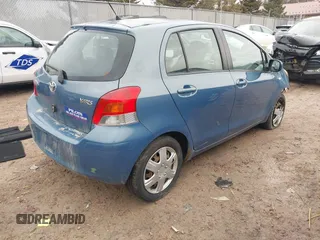 2009 Toyota Yaris with VIN JTDKT903195255240, listed as a IAAI auction lot 41650800 with 168,991 mi miles. Bid and sale history available at carsss.com. Image 4.