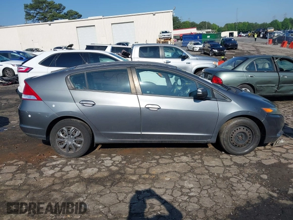 2010 Honda Insight LX with VIN JHMZE2H52AS032697, listed as a IAAI auction lot 42255794 with 262,251 mi miles and . Bid and sale history available at DreamBid. Image 13.