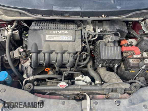2010 Honda Insight LX с VIN JHMZE2H59AS032860, выставлен на аукционе Copart как лот 64378915 с пробегом 253 555 миль миль и Чистый • Clean title. История ставок и продаж доступна на DreamBid. Изображение 7.