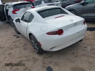 2021 Mazda MX-5 Miata Grand Touring with VIN JM1NDAM71M0454514, listed as a IAAI auction lot 41940252 with Not provided miles and . Bid and sale history available at DreamBid. Image 3.