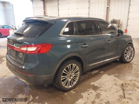 2016 Lincoln MKX Reserve with VIN 2LMTJ8LR8GBL48611, listed as a IAAI auction lot 41559403 with 125,393 mi miles. Bid and sale history available at carsss.com. Image 4.