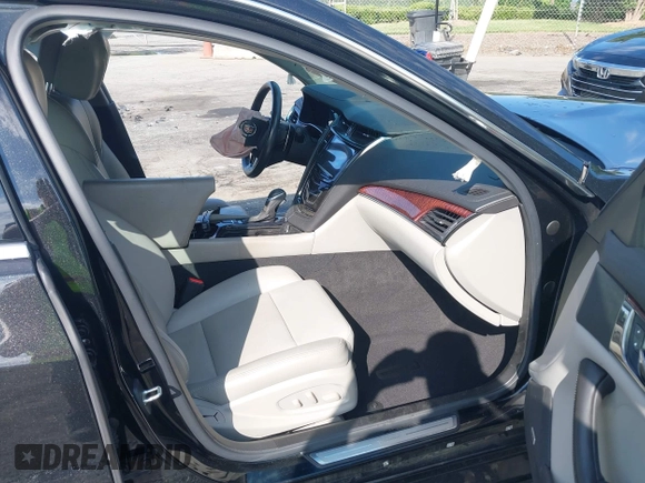 2014 Cadillac CTS RWD with VIN 1G6AP5SX9E0134183, listed as a IAAI auction lot 42190674 with 59,603 mi miles and . Bid and sale history available at DreamBid. Image 5.
