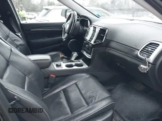 2019 Jeep Grand Cherokee Summit with VIN 1C4RJFJGXKC669686, listed as a IAAI auction lot 41465553 with 72,127 mi miles. Bid and sale history available at carsss.com. Image 5.