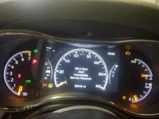 2019 Jeep Grand Cherokee Laredo E with VIN 1C4RJFAG5KC529092, listed as a Copart auction lot 49801565 with 66,048 mi miles and Salvage Title. Bid and sale history available at carsss.com. Image 9.