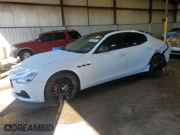 2017 Maserati Ghibli S Q4 z VIN ZAM57RTAXH1221570, wystawiony jako Copart lot #56003065 z przebiegiem 96 414 mil mil oraz Szkody całkowita. Historia ofert i sprzedaży dostępna na DreamBid. Obrazek 1.