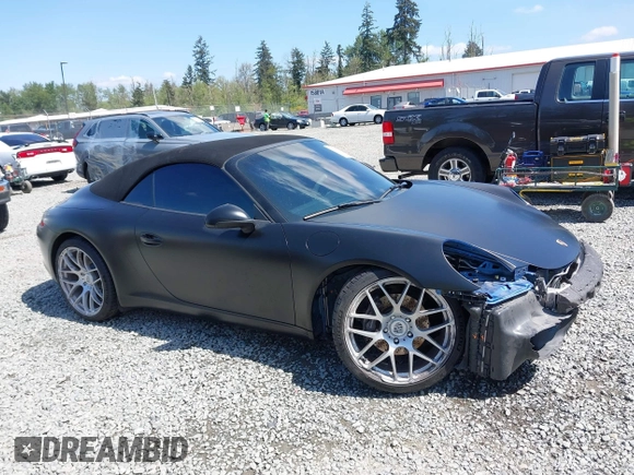 2014 Porsche 911 Carrera z VIN WP0CA2A94ES140857, wystawiony jako IAAI lot #42159010 z przebiegiem 46 230 mil mil oraz . Historia ofert i sprzedaży dostępna na DreamBid. Obrazek 14.