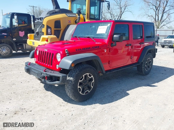 2015 Jeep Wrangler Unlimited Rubicon Hard Rock with VIN 1C4HJWFG9FL525556, listed as a IAAI auction lot 41973576 with 246,949 mi miles. Bid and sale history available at carsss.com. Image 2.