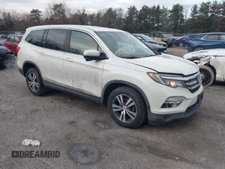 2017 Honda Pilot EX-L with VIN 5FNYF5H58HB010674, listed as a IAAI auction lot 41220864 with 140,559 mi miles. Bid and sale history available at carsss.com. Image 1.