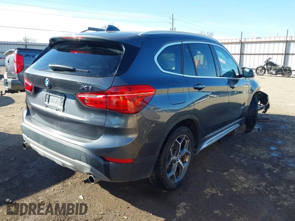 2017 BMW X1 sDrive28i with VIN WBXHU7C30H5H32753, listed as a IAAI auction lot 41441791 with 100,072 mi miles. Bid and sale history available at carsss.com. Image 4.