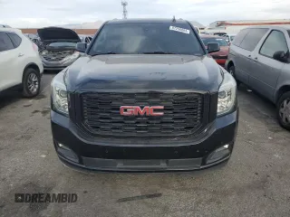 2019 GMC Yukon SLE with VIN 1GKS1AKC2KR101675, listed as a Copart auction lot 87256804 with 144,572 mi miles and Salvage Title. Bid and sale history available at carsss.com. Image 5.