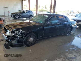 2003 Ford Police Interceptor Street Appear with VIN 2FAHP71W63X181563, listed as a Copart auction lot 43734574 with 195,534 mi miles and Salvage title. Bid and sale history available at DreamBid. Image 1.