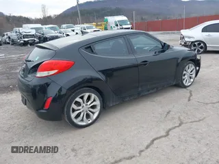 2012 Hyundai Veloster w/Black Int with VIN KMHTC6AD8CU066779, listed as a IAAI auction lot 41699960 with 160,875 mi miles and . Bid and sale history available at DreamBid. Image 4.