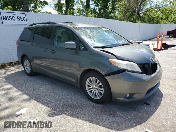 2014 Toyota Sienna XLE with VIN 5TDYK3DC1ES453924, listed as a Copart auction lot 56148565 with 198,185 mi miles and Clean title. Bid and sale history available at DreamBid. Image 4.