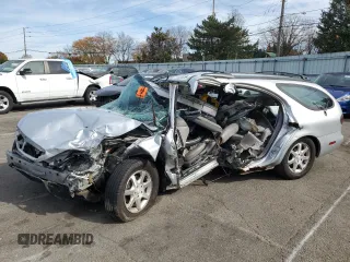 2002 Mercury Sable LS Premium with VIN 1MEHM59S12G607493, listed as a Copart auction lot 78230594 with 127,913 mi miles and Salvage Title. Bid and sale history available at DreamBid. Image 1.
