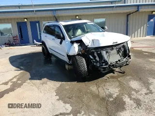2013 Jeep Grand Cherokee Overland with VIN 1C4RJECG1DC525986, listed as a Copart auction lot 42040775 with 148,784 mi miles and Salvage Title. Bid and sale history available at carsss.com. Image 14.