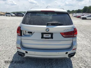 2015 BMW X5 xDrive50i z VIN 5UXKR6C50F0J75350, wystawiony jako Copart lot #55146105 z przebiegiem Nie podano mil oraz Szkoda całkowita • Salvage title. Historia ofert i sprzedaży dostępna na DreamBid. Obrazek 6.