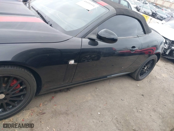 2008 Jaguar XK with VIN SAJWA44B885B23686, listed as a IAAI auction lot 41459334 with 105,432 mi miles. Bid and sale history available at carsss.com. Image 14.