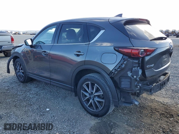 2018 Mazda CX-5 Grand Touring with VIN JM3KFADM8J1330353, listed as a Copart auction lot 54752325 with 96,577 mi miles and Salvage Title. Bid and sale history available at DreamBid. Image 2.
