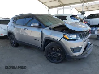 2019 Jeep Compass Latitude with VIN 3C4NJDBB4KT754484, listed as a IAAI auction lot 42324284 with 85,637 mi miles and . Bid and sale history available at DreamBid. Image 1.