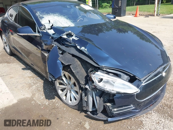 2014 Tesla Model S 60 with VIN 5YJSA1H17EFP65983, listed as a IAAI auction lot 42399288 with 166,365 mi miles and . Bid and sale history available at DreamBid. Image 6.