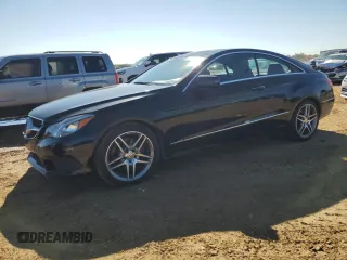 2015 Mercedes-Benz E 400 with VIN WDDKJ6HB7FF300175, listed as a Copart auction lot 82913174 with 52,427 mi miles and Salvage Title. Bid and sale history available at DreamBid. Image 1.