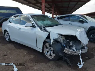 2007 BMW 5 Series 530i with VIN WBANE73537CM56751, listed as a IAAI auction lot 41461577 with 218,059 mi miles. Bid and sale history available at carsss.com. Image 1.
