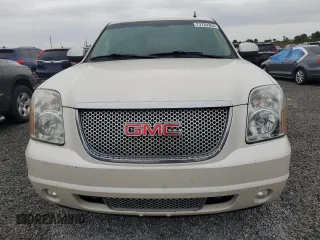 2014 GMC Yukon Denali with VIN 1GKS2EEF0ER102970, listed as a Copart auction lot 73739364 with 125,312 mi miles and Non Repairable. Bid and sale history available at carsss.com. Image 5.