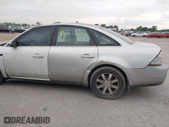 2008 Ford Taurus SEL z VIN 1FAHP24W78G174813, wystawiony jako IAAI lot #42482599 z przebiegiem 154 115 mil mil oraz . Historia ofert i sprzedaży dostępna na DreamBid. Obrazek 6.