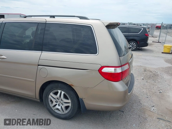 2005 Honda Odyssey EX with VIN 5FNRL38475B029026, listed as a IAAI auction lot 42489079 with 156,075 mi miles and . Bid and sale history available at DreamBid. Image 14.