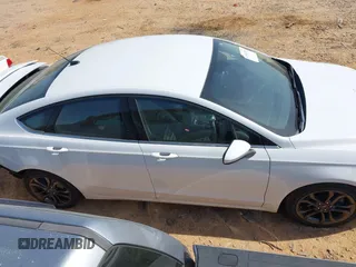 2018 Ford Fusion SE with VIN 3FA6P0H76JR227014, listed as a IAAI auction lot 41901203 with 147,454 mi miles and . Bid and sale history available at DreamBid. Image 13.
