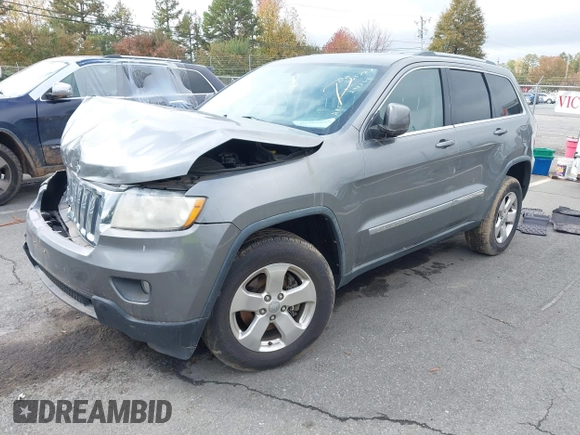 2012 Jeep Grand Cherokee Laredo with VIN 1C4RJFAG8CC298268, listed as a IAAI auction lot 40787833 with 206,486 mi miles. Bid and sale history available at carsss.com. Image 16.