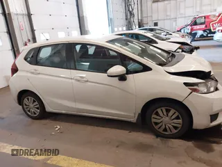2015 Honda Fit LX with VIN 3HGGK5H57FM106670, listed as a IAAI auction lot 42097655 with 116,303 mi miles and . Bid and sale history available at DreamBid. Image 13.