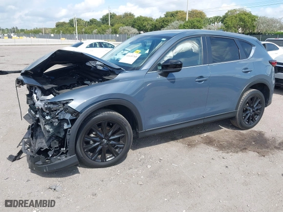2023 Mazda CX-5 2.5 S Carbon Edition with VIN JM3KFBCM1P0106881, listed as a IAAI auction lot 41610768 with 21,184 mi miles. Bid and sale history available at carsss.com. Image 18.